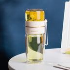 Double-walled glass bottle with tea strainer and infuser