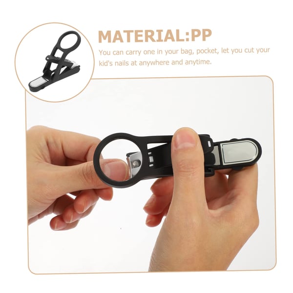 Nail clipper with magnifying glass