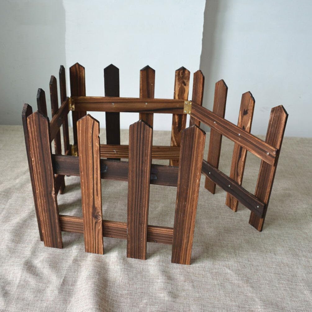 Decorative wooden garden fence for flower beds and outdoor areas