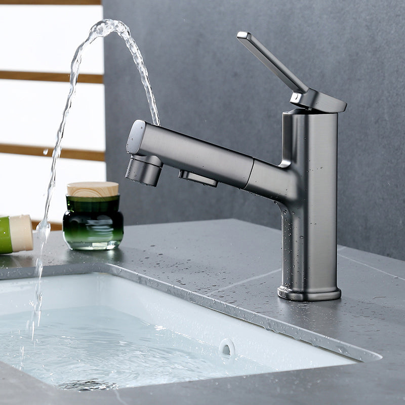 Modern bathroom sink faucet with brass lever handles and swivel spout