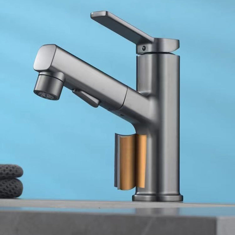 Modern bathroom sink faucet with brass lever handles and swivel spout