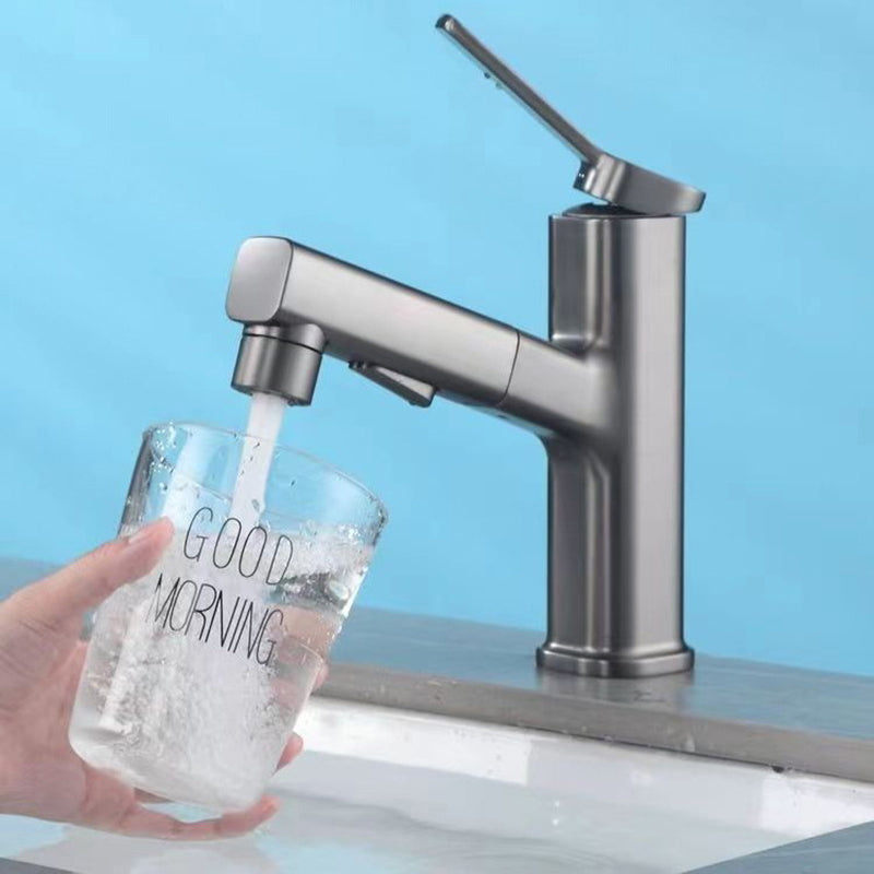 Modern bathroom sink faucet with brass lever handles and swivel spout