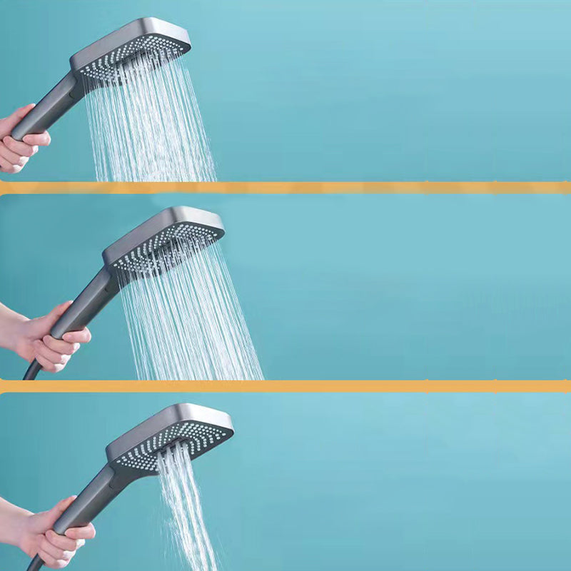 Modern adjustable swivel shower head metal shower fixture on the wall
