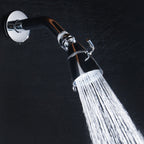 Round shower head made of stainless steel in silver wall-mounted shower head