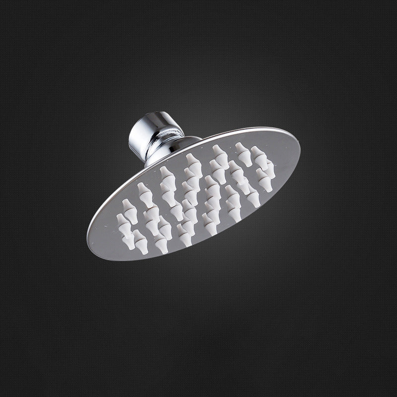 Round shower head made of stainless steel in silver wall-mounted shower head