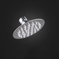Round shower head made of stainless steel in silver wall-mounted shower head