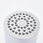 Round shower head made of stainless steel in silver wall-mounted shower head