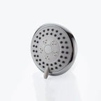 Round shower head made of stainless steel in silver wall-mounted shower head