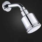 Round shower head made of stainless steel in silver wall-mounted shower head