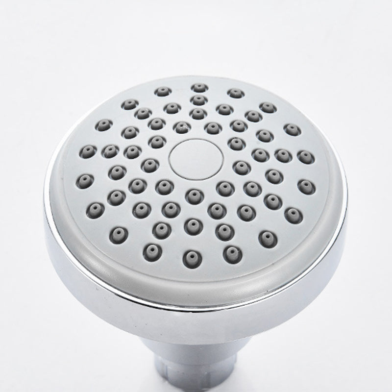 Round shower head made of stainless steel in silver wall-mounted shower head