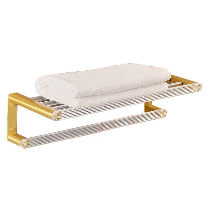 Metal and acrylic bathroom accessories as a single piece or in a set in gold