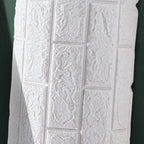 Modern wall-ceiling element for sticking with 3D embossing in white