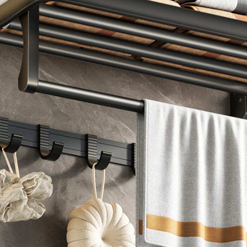 Contemporary bathroom accessory set with black finish and bath shelf/towel bar
