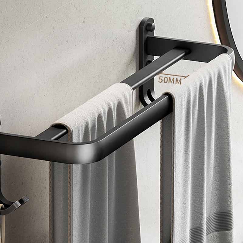 Contemporary bathroom accessory set with black finish and bath shelf/towel bar