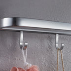 Contemporary bathroom accessory set made of aluminum with towel holder/bath shelf