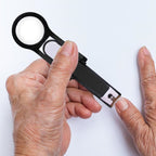 Nail clipper with magnifying glass