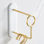 Modern bathroom accessories as a single piece or as a set in marble and metal