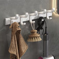 Modern white bathroom accessories as a single piece or in a set made of metal
