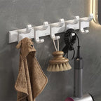 Modern white bathroom accessories as a single piece or in a set made of metal