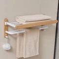 Modern natural bathroom accessories as a single piece or in a set made of solid wood
