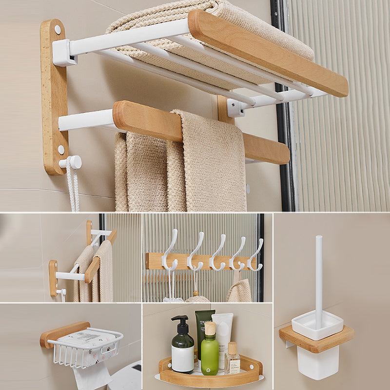 Modern natural bathroom accessories as a single piece or in a set made of solid wood