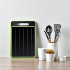 Double-sided cutting board with integrated defrosting plate