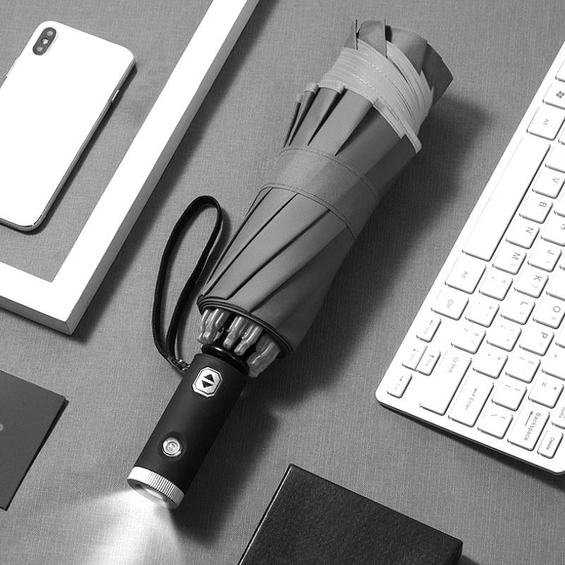Automatic foldable umbrella with reflective edge