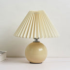 Nordic minimalist 1-light table lamp made of ceramic with pleats