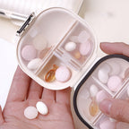 Portable daily pill box