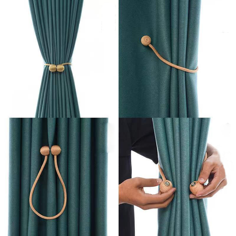 Curtain tiebacks with magnetic curtain clasp