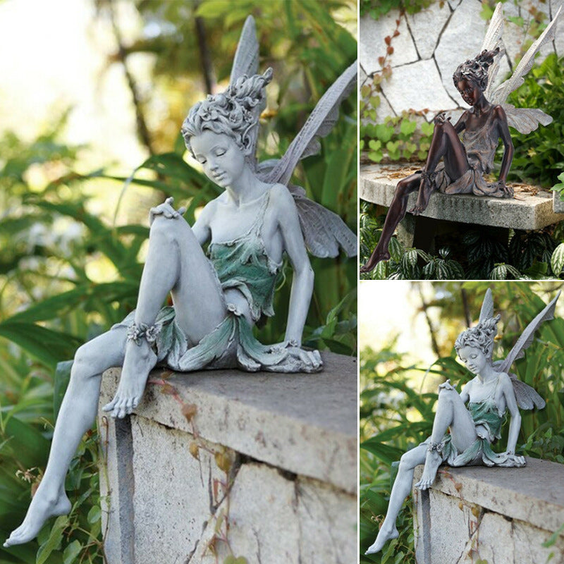 Statue of sitting fairy in the garden