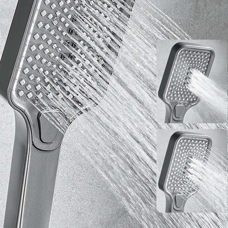 Wall-mounted shower system Gray Adjustable spray pattern Lever handle Shower hose Shower set