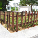 Decorative wooden garden fence for flower beds and outdoor areas