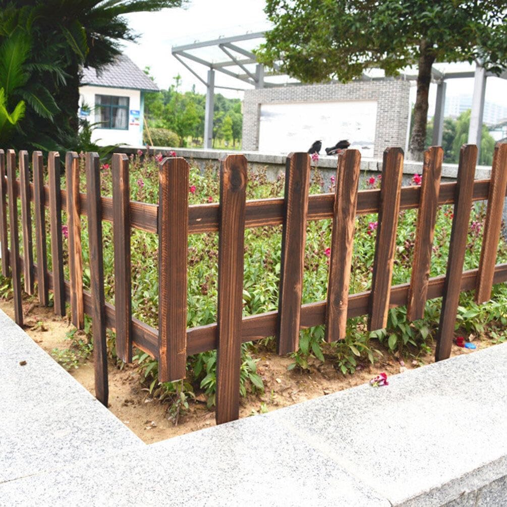 Decorative wooden garden fence for flower beds and outdoor areas