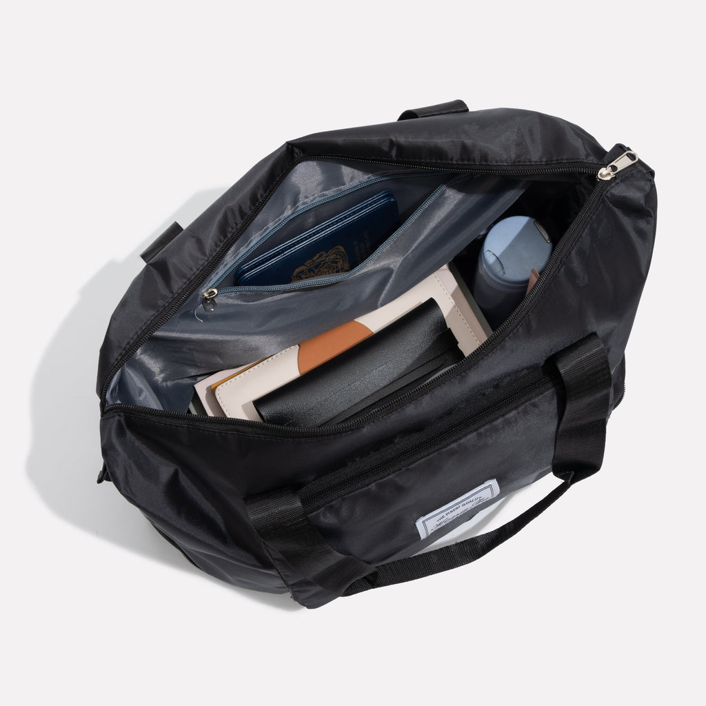 LuxeVoyage Elite Travel Tote | Stylish foldable luggage for effortless travel