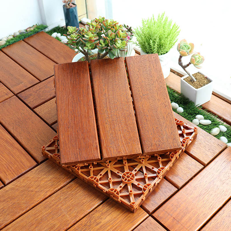 Classic wooden deck tiles connecting composite patio tiles