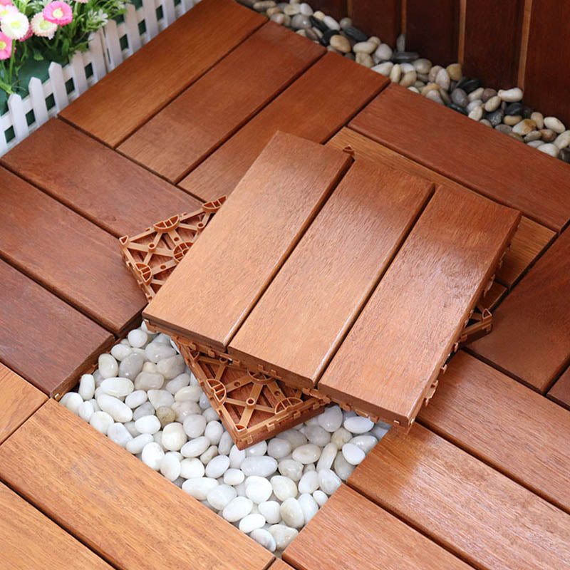 Classic wooden deck tiles connecting composite patio tiles