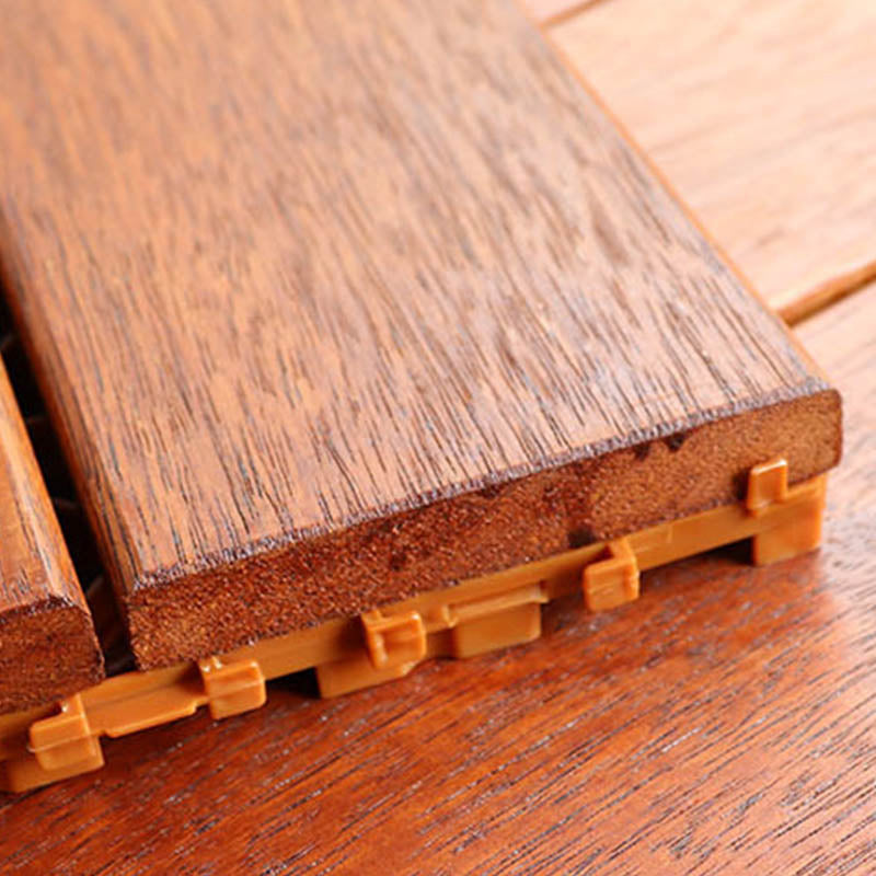 Classic wooden deck tiles connecting composite patio tiles