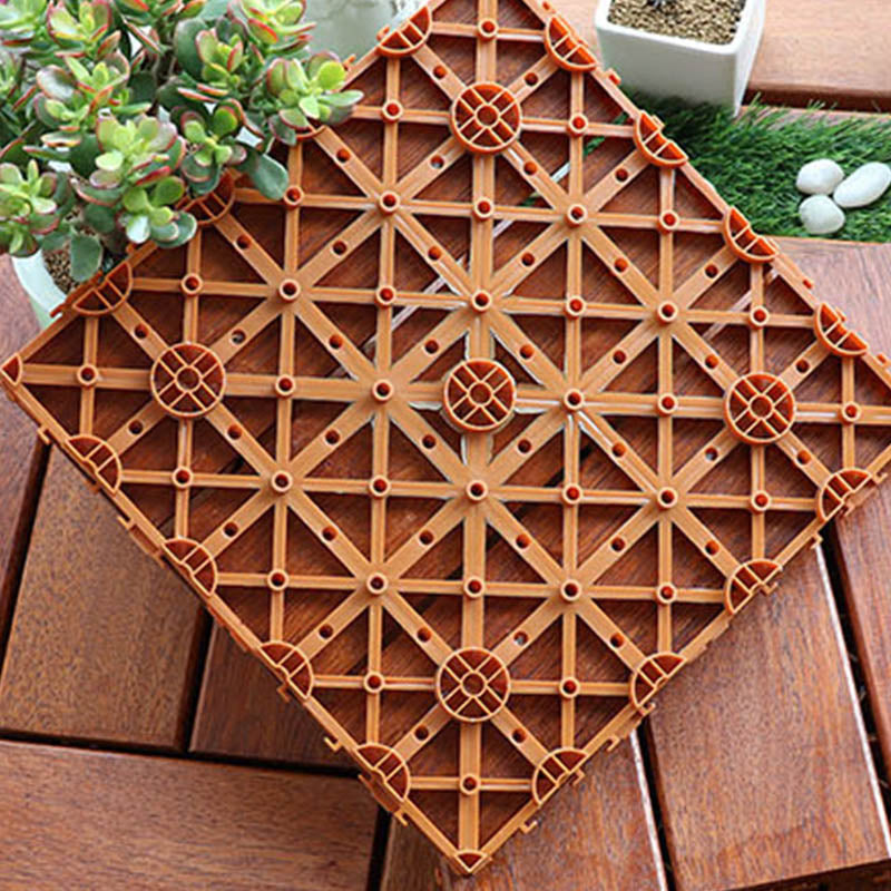 Classic wooden deck tiles connecting composite patio tiles