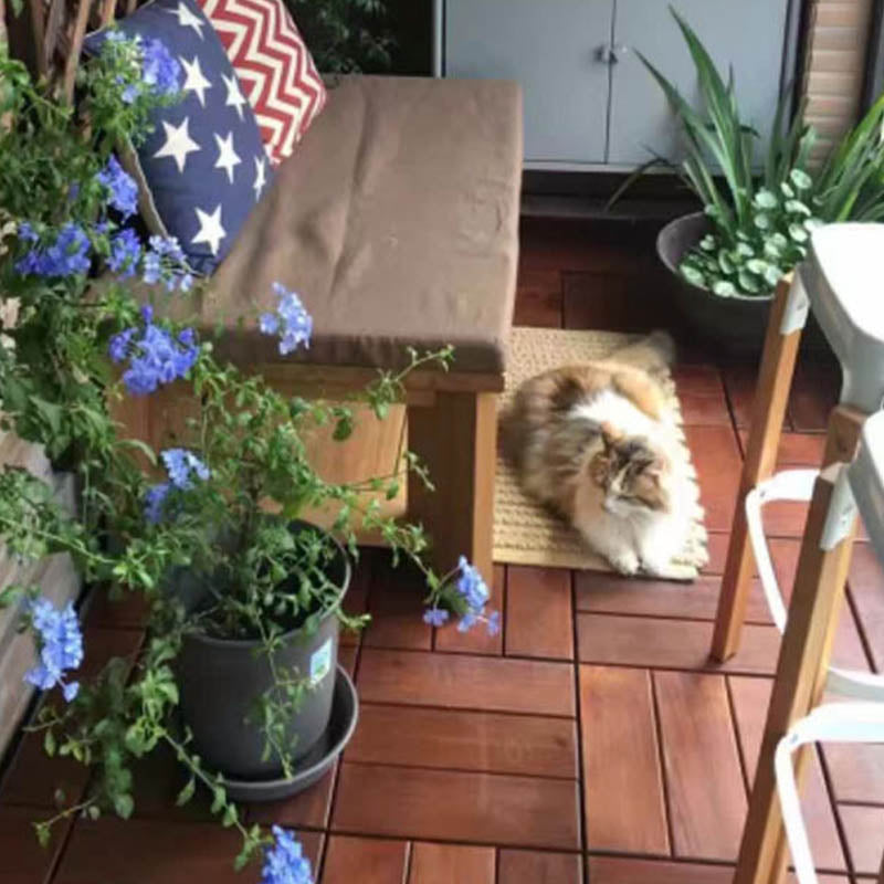 Classic wooden deck tiles connecting composite patio tiles