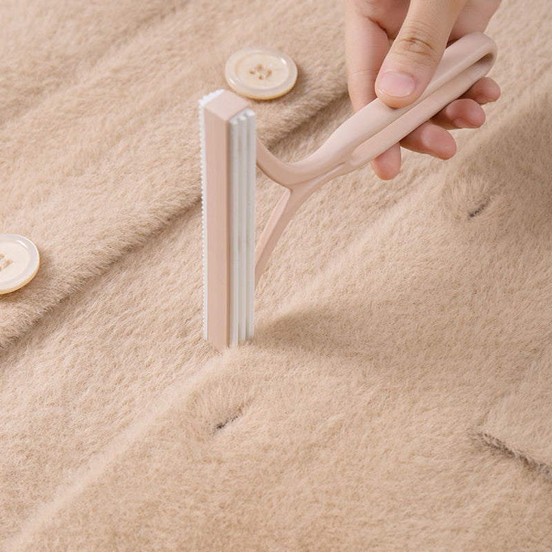 Double-sided manual hair remover