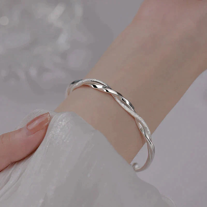 Elegant Woven Silver Bracelet