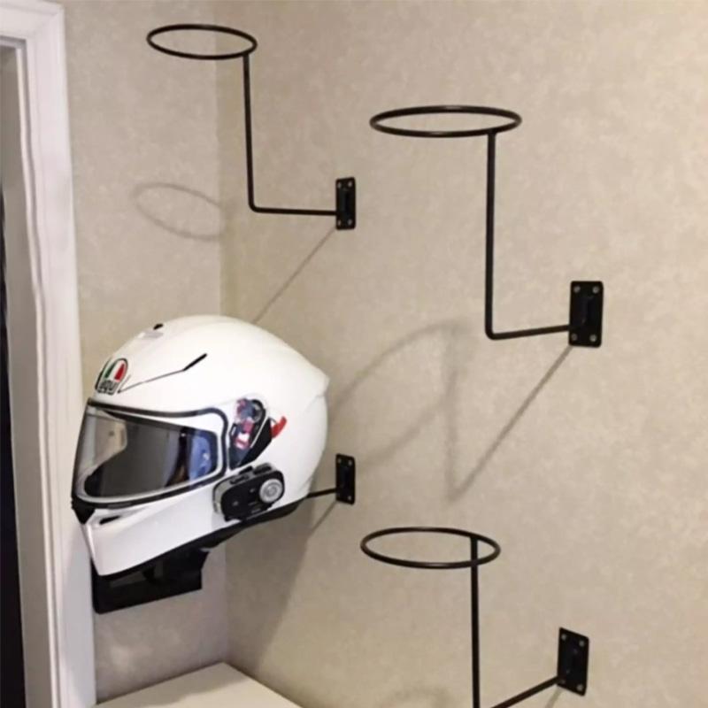 Wall-mounted helmet holder