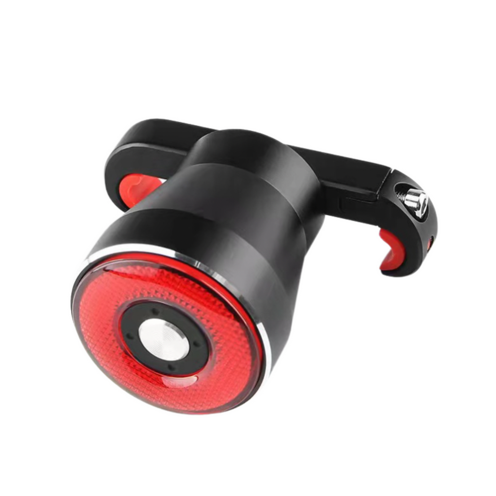 Slim bike taillight with automatic brake sensor and light detection