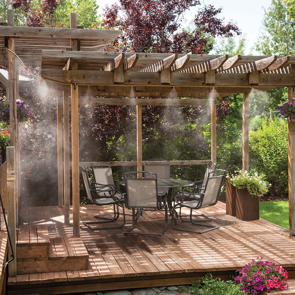 Spray irrigation system – Water hose with spray nozzles for refreshing cooling in the garden