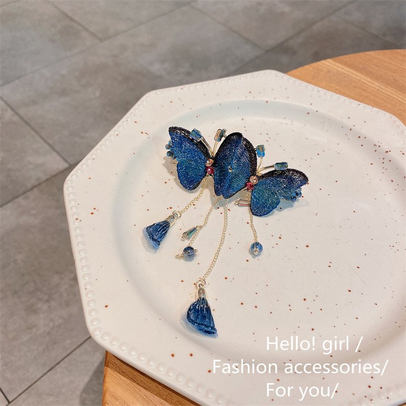 Dreamy butterfly hair clip with fringes
