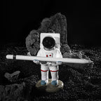 Support for phones or pens in astronaut decorations