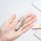 Ultra-slim portable nail clipper
