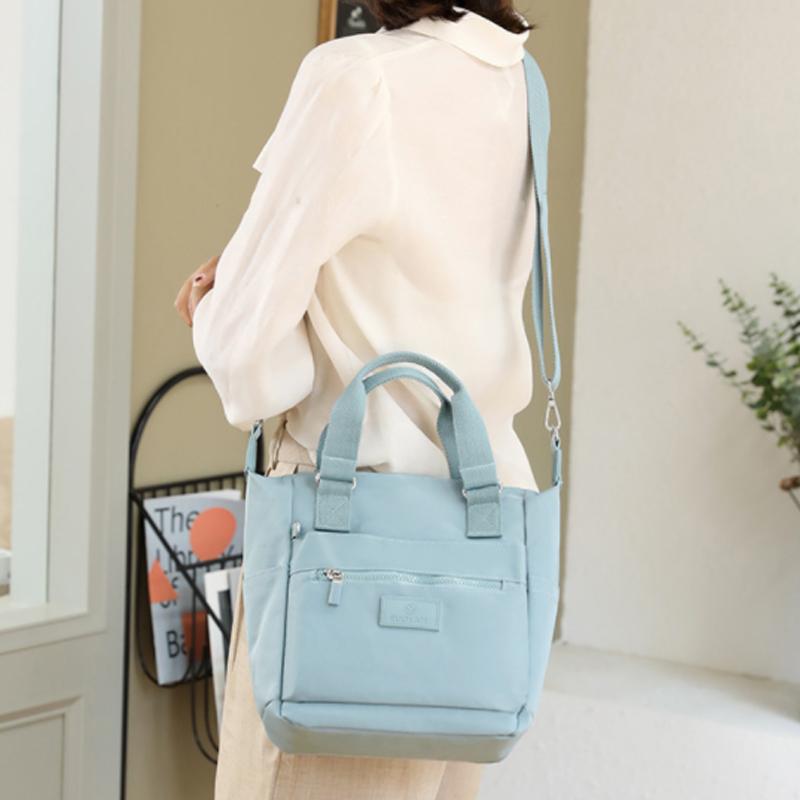 Waterproof Nylon Crossbody Bag with 7 Pockets and Adjustable Shoulder Strap