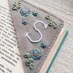 Personalized hand-stitched corner bookmark